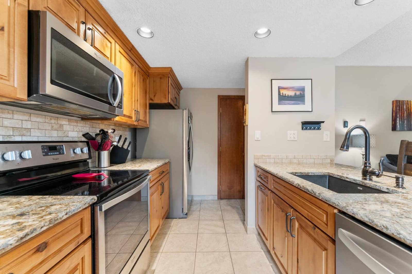 Kitchen with granite counters and stainless appliances